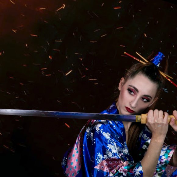 Japanese samurai girl holding a sward