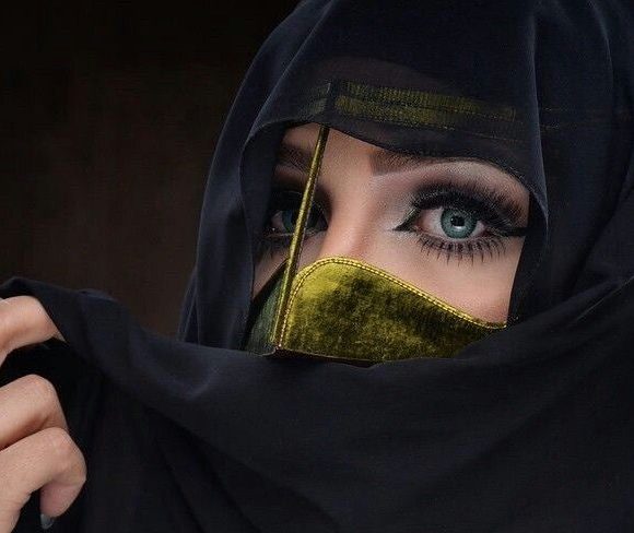 Arab woman covering her face