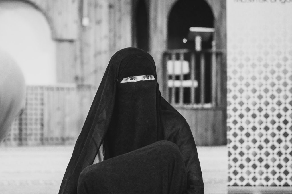 An Arab woman wearing niqab - black and white photograph