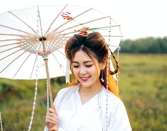 Chinese girl with a white umbrella