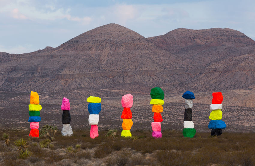 Magic Mountains - art by Ugo Rondinone, colorful stone sculptures in Nevada desert